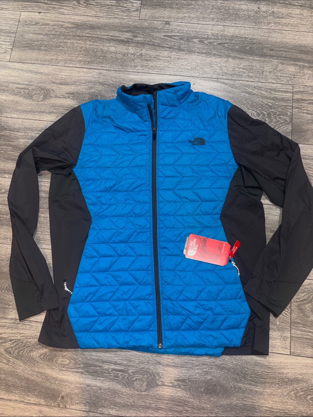 The North Face Blue and Black Hybrid Puffer Jacket